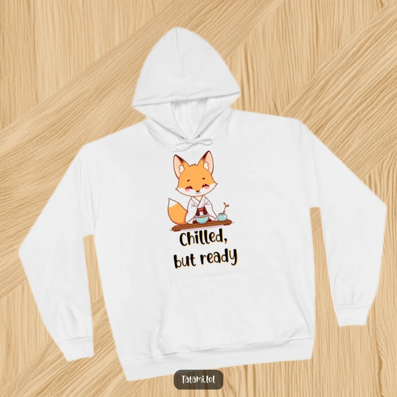 Funny hoodie featuring a fox in a kimono, masterfully executing a tea ceremony pose with comedic grace.