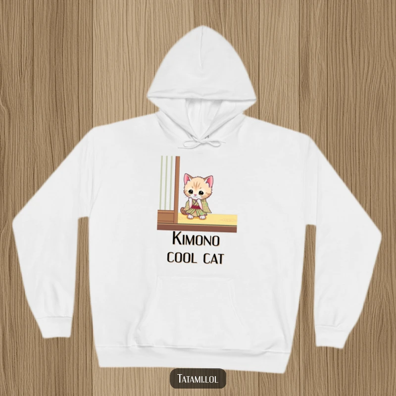 Funny kitten in a tiny kimono on a hoodie, playfully engaging with a tatami mat corner, cozy apparel.